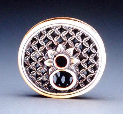 Achterkant van een netsuke, ca. 1870 door Ozaki Kokusai